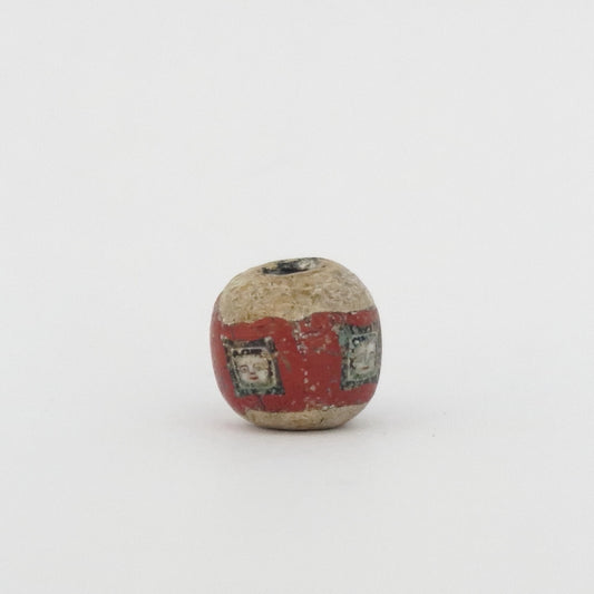 ลูกปัดแก้วโมเสคโรมันโบราณรูปหน้า