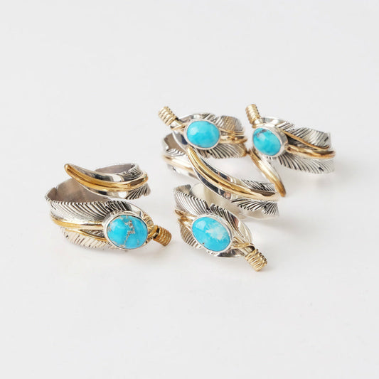 แหวนปรับขนาดได้รูปขนนก โดย ฮาร์วีย์ เมส