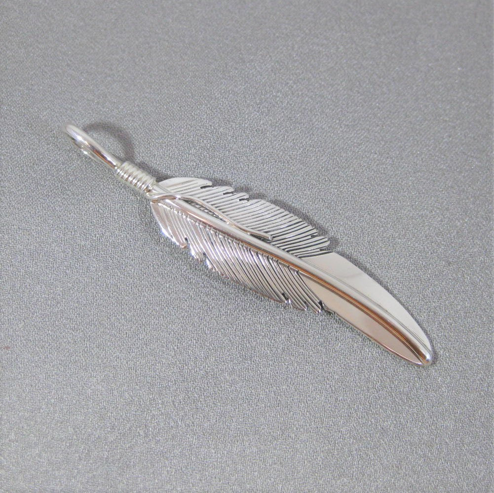 Feather pendant by Harvey Mace (silver or gold)