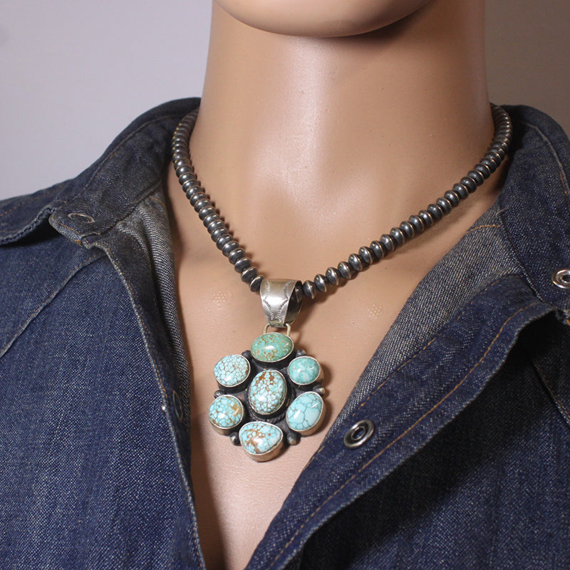 Cluster pendant by Shelia Tso