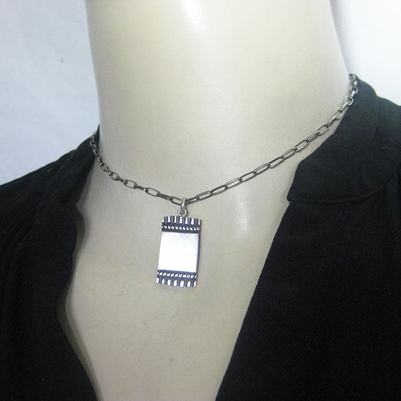 Coin Silver Pendant by Darryl Dean Begay