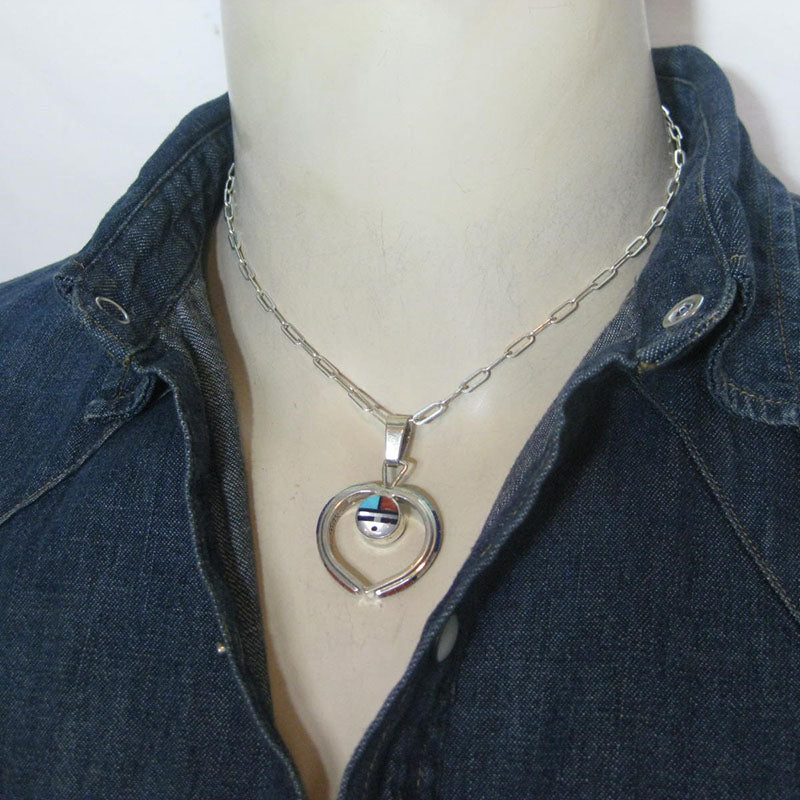 ドン・デワによるサンフェイスペンダントとイヤリングセット