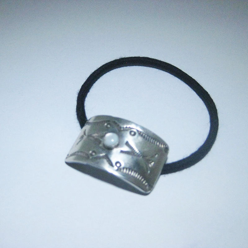 Hair concho by Arnold Goodluck