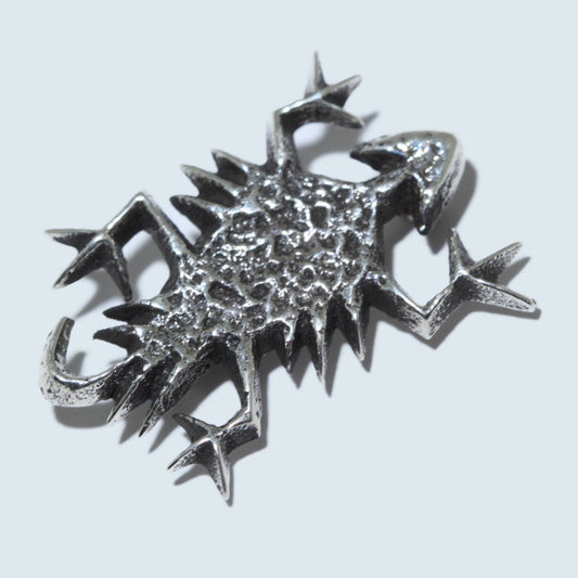 Silver Pin by Aaron Anderson