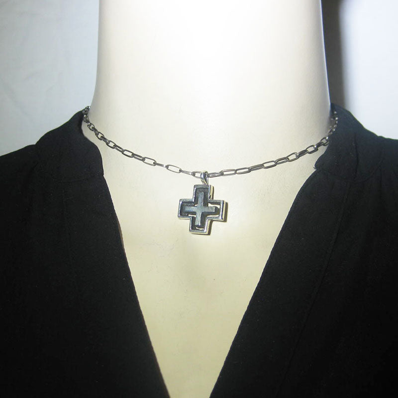 Cross pendant by Aaron Anderson