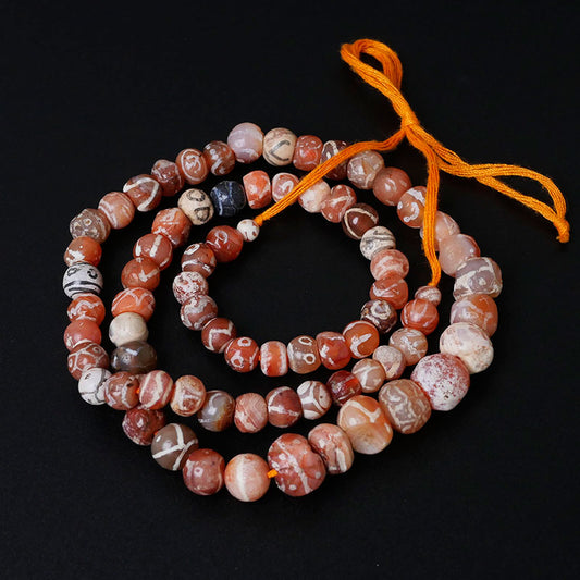 エッチングされたカーネリアンビーズのストランド