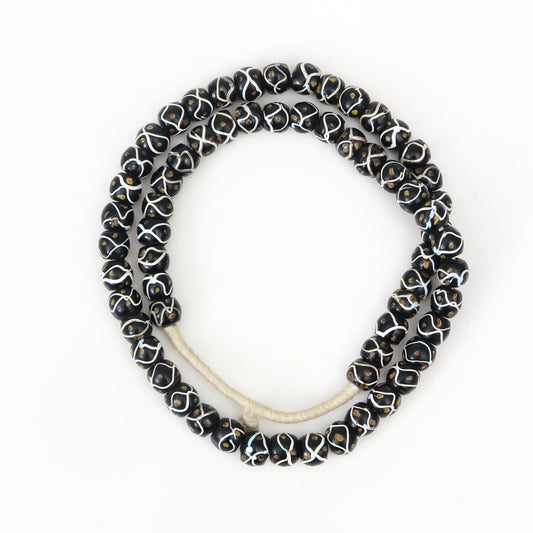 Antike venezianische schwarze Klapperschlangenaugen-Perlenkette
