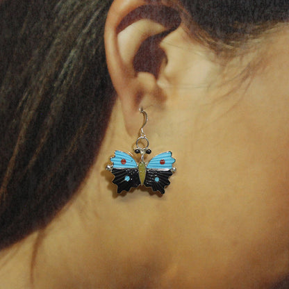 塔玛拉·平托的蝴蝶耳环