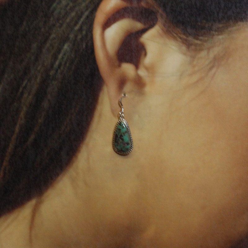 Boucles d'oreilles chinoises par Robin Tsosie