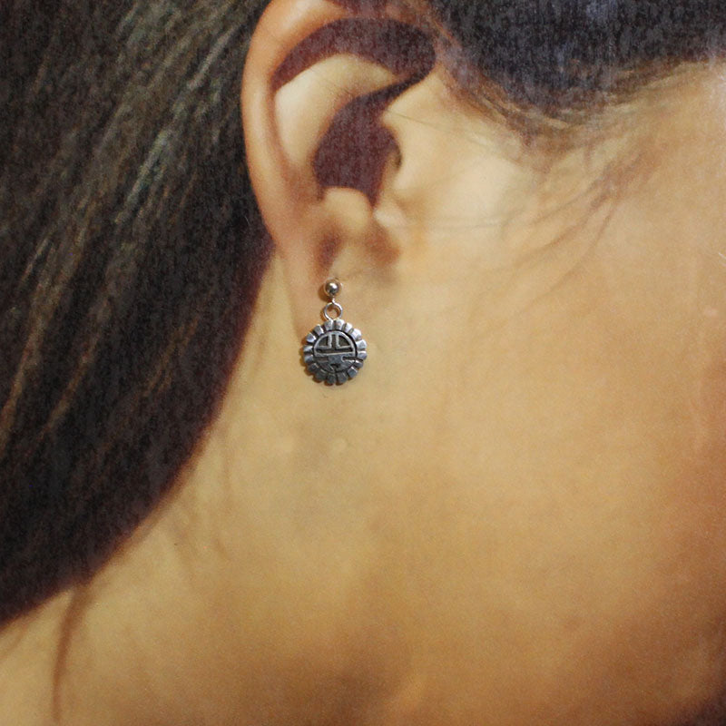 傑森·塔卡拉的銀耳環