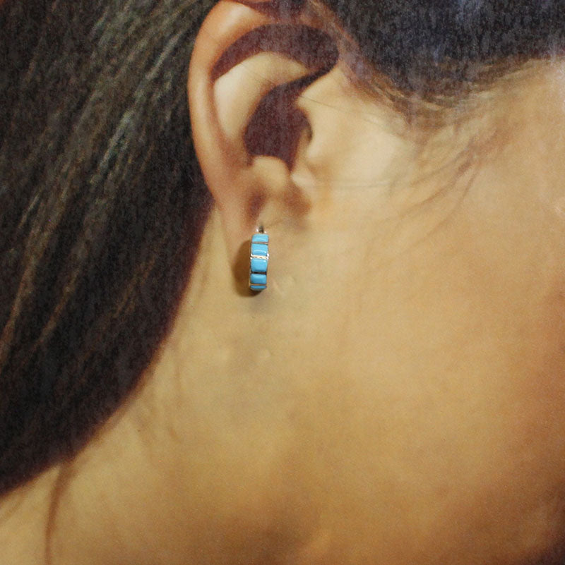 Boucles d'oreilles incrustées par les Navajos