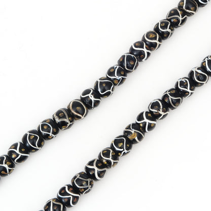 Antike venezianische schwarze Klapperschlangenaugen-Perlenkette