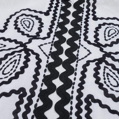 Cord Embroidered Pullover